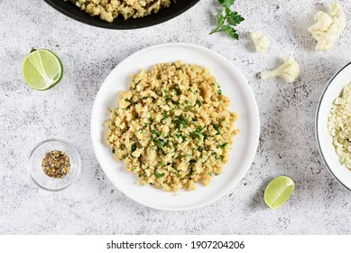 Roasted Cauliflower Rice On Light Stone Background. Top View, Flat Lay
