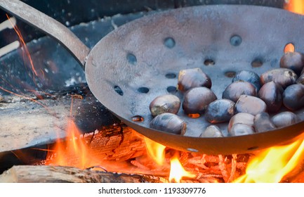 Roasted Chestnut - Specialty Ardéchoise - Specialty Of Ardèche In France - Chestnut On The Flame Of A Fire Of Wood