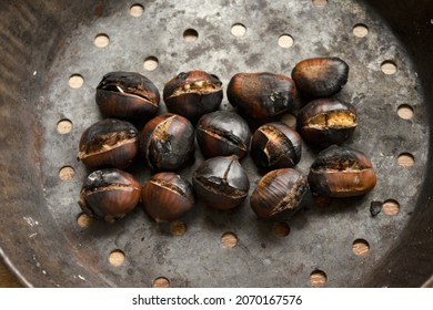 Roasted Chestnuts In The Typical Perforated Pan