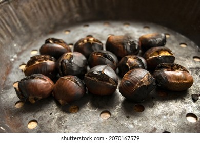 Roasted Chestnuts In The Typical Perforated Pan