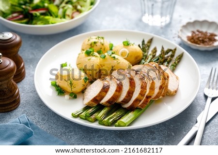 Roasted chicken breast, boiled new potato and grilled asparagus