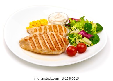 Roasted chicken breast with mix salad, isolated on white background.