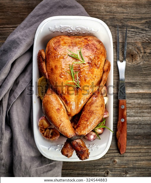 Roasted Chicken On Wooden Table Top Stock Photo (Edit Now) 324544883