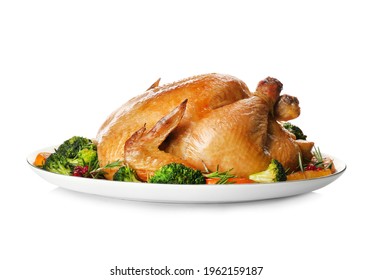 Roasted chicken with oranges and vegetables isolated on white