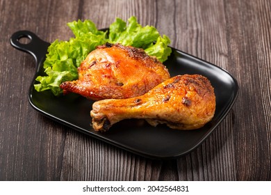 Roasted Chicken Pieces With Lettuce Salad.