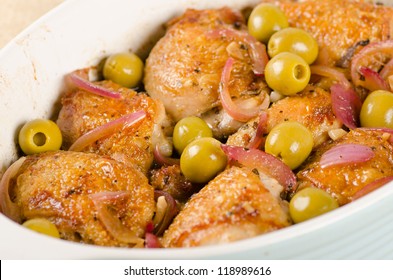 Roasted chicken thighs with olives and red onion