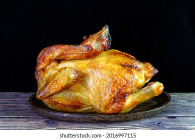 Roasted chicken, Traditional Cantonese roasted whole chicken for Chinese new year, tomb sweeping day, and all Chinese festivals and holidays - Shutterstock ID 2016997115