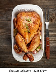 Roasted Chicken With Vegetables On Wooden Table, Top View