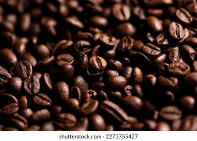 Roasted coffee beans close up background  - Shutterstock ID 2273755427