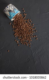 Roasted coffee beans in cup 