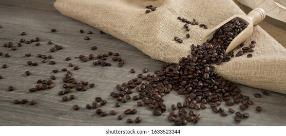 Roasted Coffee Beans Ion A Wooden Background