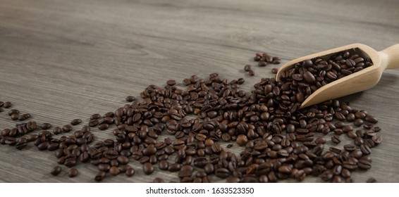 Roasted Coffee Beans Ion A Wooden Background