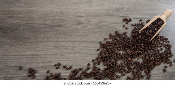 Roasted Coffee Beans Ion A Wooden Background