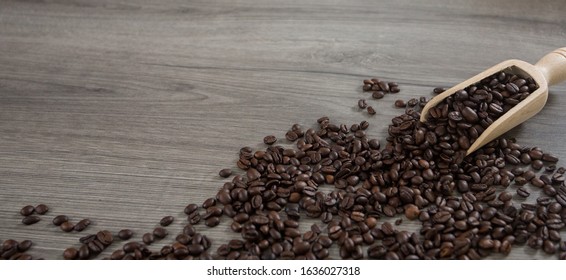 Roasted Coffee Beans Ion A Wooden Background