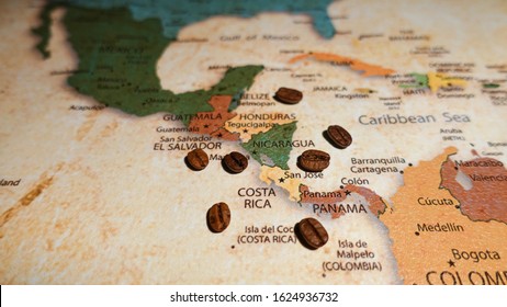 Roasted coffee beans on a map of Central America.
