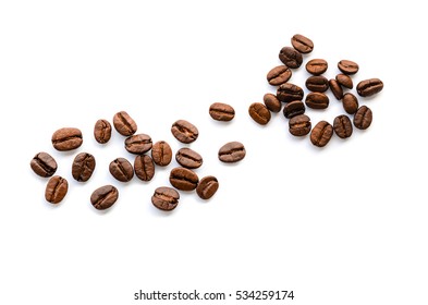 Roasted coffee beans and solated on a white background. - Shutterstock ID 534259174