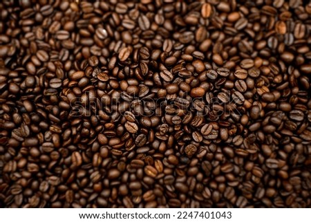 Roasted coffee beans texture background.