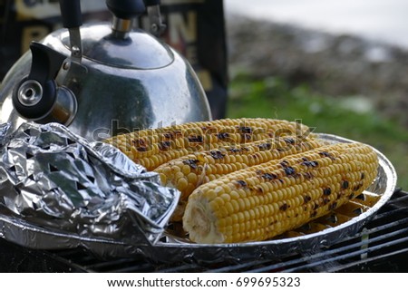 Roasted corn with teapot
