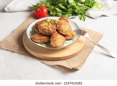 Roasted Cutlets On Plate With Fork. Side View.