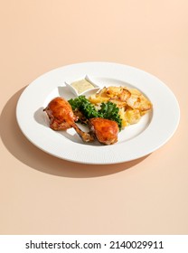 Roasted Duck Confit Served On White Plate Top View On Beige Background