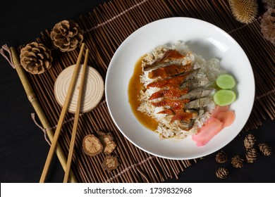 Roasted Duck On Rice With Chopstick In White Plate,Thai Street Food.