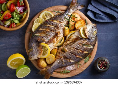 Roasted Fish And Potatoes, Served On Wooden Tray. Overhead, Horizontal - Image