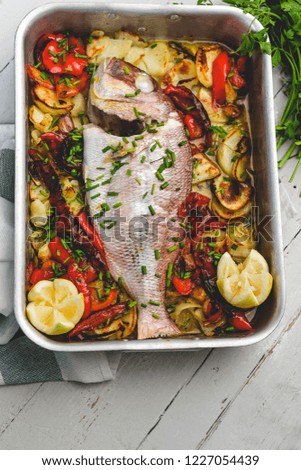 Similar – Rosa Dorado Fish in baking tin