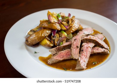 Roasted Flank Steak With Potatoes And Vegetables 