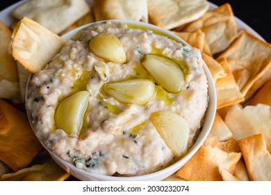 Roasted Garlic And Rosemary White Bean Dip: Dip Made From Cannellini Beans, Olive Oil, And Roasted Garlic Served With Pita Chips