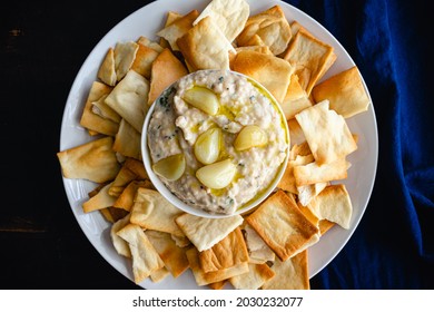 Roasted Garlic And Rosemary White Bean Dip: Dip Made From Cannellini Beans, Olive Oil, And Roasted Garlic Served With Pita Chips