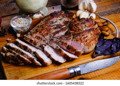 roasted ham composition on a wooden background