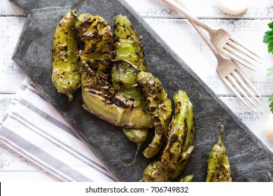 Roasted Hatch Chili Peppers On The Cutting Board. Fall Harvest. Summer Menu. Rustic Style. Hatch Green Chili Season.