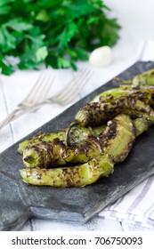 Roasted Hatch Chili Peppers On The Cutting Board. Fall Harvest. Summer Menu. Rustic Style. Vegetarian Menu. Green Chilies. Hatch Chile Festival.