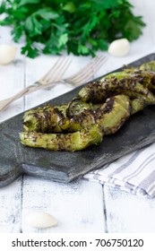 Roasted Hatch Chili Peppers On The Cutting Board. Fall Harvest. Summer Menu. Rustic Style. Hatch Green Chili Season.