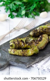 Roasted Hatch Chili Peppers On The Cutting Board. Fall Harvest. Summer Menu. Rustic Style. Hatch Green Chili Season.