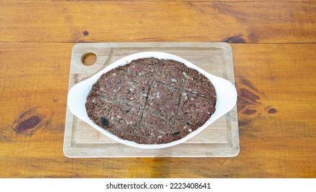 Roasted kebab, Typical Arabic delicacy, also very common in Brazil. Made of minced meat, wheat and mint - Shutterstock ID 2223408641