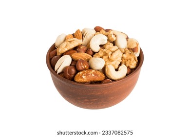 Roasted mix nut in bowl isolated on white background. mix nut is snack or raw of cook. Healthy food concept.