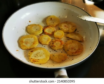 Roasted Parsnip Slices In A Pan.