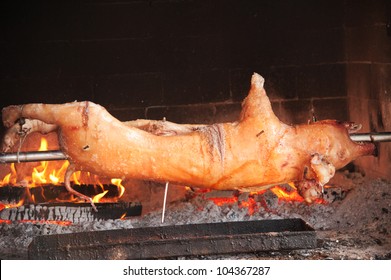 Roasted pig on the rack in Croatian restaurant