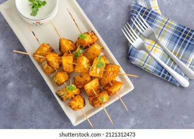 Roasted Pineapple With Condiment Top Down Photo