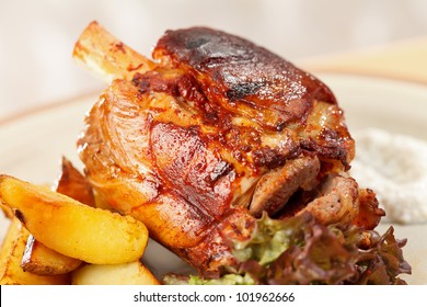 Roasted Pork Knuckle With Potatoes