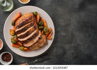 Roasted pork Loin with carrot and broccoli. Grilled sliced Pork Meat. Top view. Copy space. - Shutterstock ID 2212055487