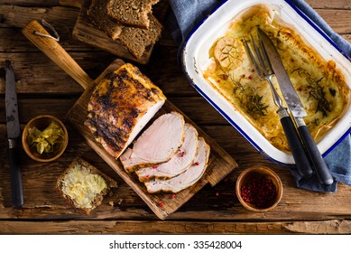 Roasted Pork Loin On The Old Wooden Table