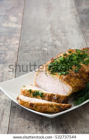 Similar – Roasted pork on wooden table