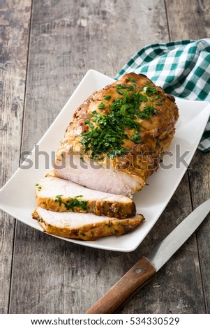 Similar – Roasted pork on wooden table