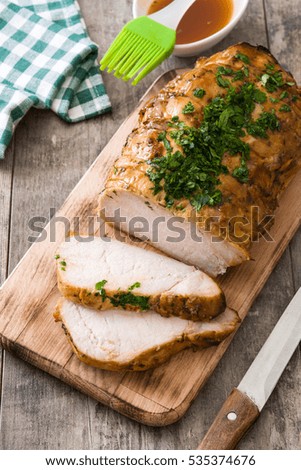 Similar – Roasted pork on wooden table