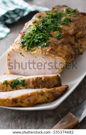 Similar – Roasted pork on wooden table