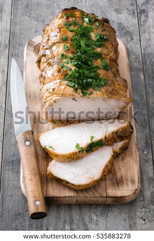 Similar – Roasted pork on wooden table