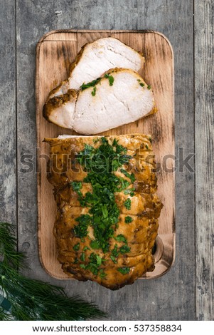 Similar – Roasted pork on wooden table