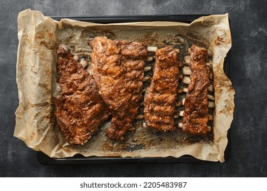 Roasted Pork Ribs On A Baking Sheet. View From Above.